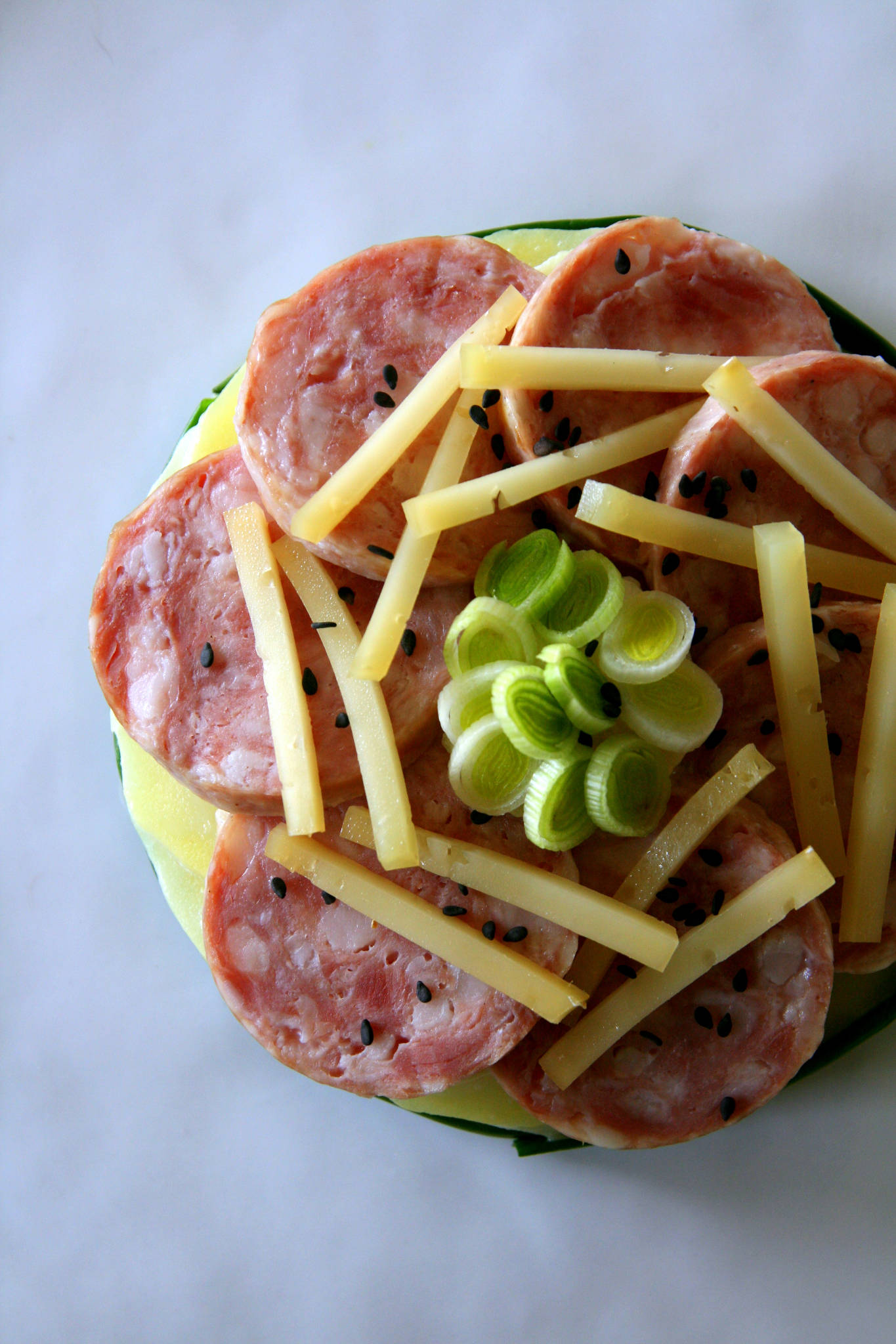 Saucisses fraîches et pommes de terre ratte persillées - Recette - Yumelise